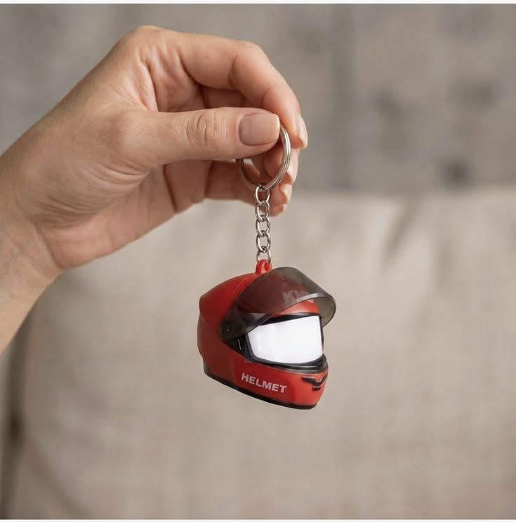Red LED light helmet keychain