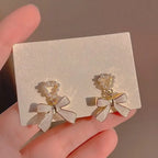 Beautiful white tag earrings Accezia