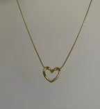 Gold heart pendant | symbol of freedom Accezia