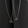 Hello kitty x batman matching pendent Accezia