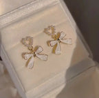 Beautiful white tag earrings Accezia